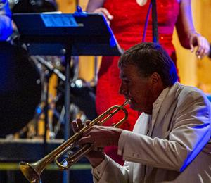 a picture of Michael Roberts playing the Trumpet